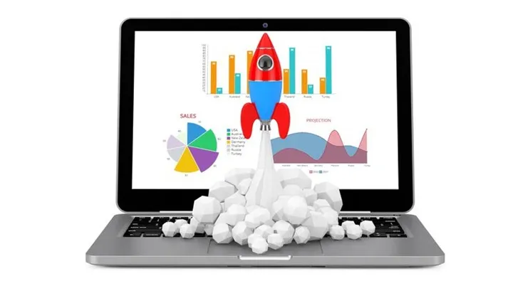 startup-concept-toy-rocket-takes-off-spewing-smoke-from-laptop-with-business-diagrams-graphics-white-background-3d-rendering_ افزایش بازدید سایت